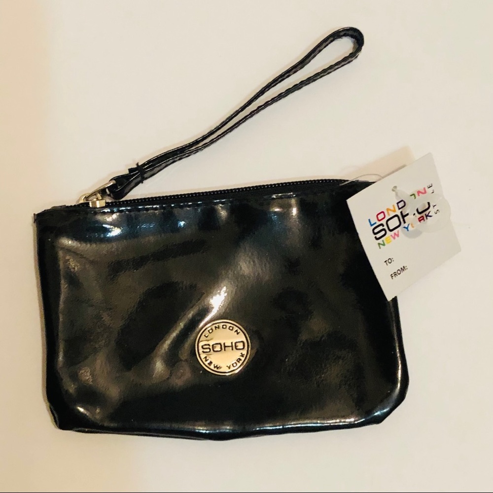 SOHO NWT wristlet with ID window.
